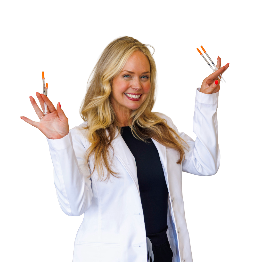 Amanda holding capped syringes at Belle Vie.